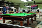 Sarajevo Snooker Play-offs: Setup with several tables, Rory McLeod playing.