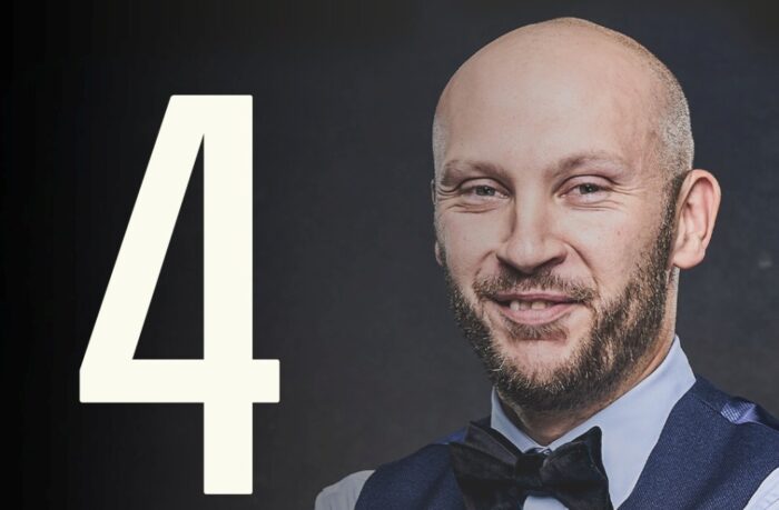Portrait von Zak Surety, daneben eine große 4 für den Century-Rekord
